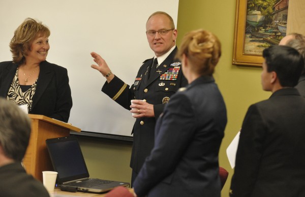 Col. David Sutherland gathers with Maine's First Lady Anne LePage (left), senior military officials and Bangor community before his speech at Husson University on Wednesday, Feb. 22, 2012. Col. Sutherland serves as the Special Assistant to the Chairman of the Joint Chiefs of Staff with a primary focus on Warrior and Family Support. Col. David Sutherland gathers with Maine's First Lady Anne LePage (left), senior military officials and Bangor community before his speech at Husson University on Wednesday, Feb. 22, 2012. Col. Sutherland serves as the Special Assistant to the Chairman of the Joint Chiefs of Staff with a primary focus on Warrior and Family Support.