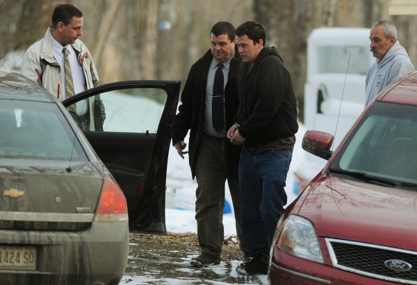 Daniel Porter (second from right) is led to a waiting police car by Maine State Police detective Brian Strout (second from left) as Bangor Police detective Larry Morrill holds the door. Porter was arrested at his father's home in Jackson and is being charged with murder in connection with the disappearance of Florida firefighter Jerry Perdomo. Porter's father Gary (right) was present when his son was arrested. Daniel Porter (second from right) is led to a waiting police car by Maine State Police detective Brian Strout (second from left) as Bangor Police detective Larry Morrill holds the door. Porter was arrested at his father's home in Jackson and is being charged with murder in connection with the disappearance of Florida firefighter Jerry Perdomo. Porter's father Gary (right) was present when his son was arrested.