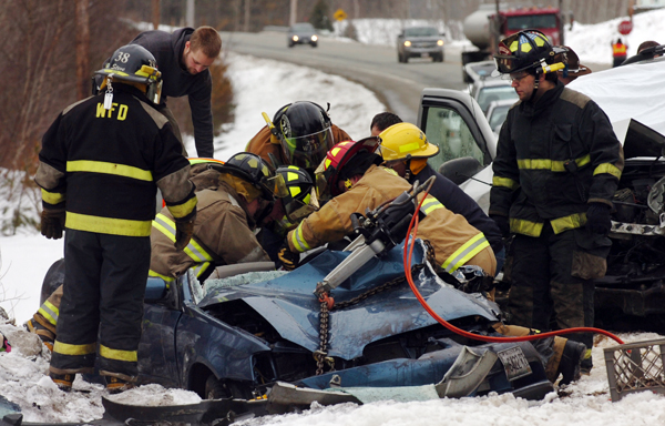 Emergency crews work to remove Louise Boudreau-Bouchard from her vehicle after she was hit head on by an SUV driven by William Hinkle Jr. while heading northbound on Route 1A in Frankfort around 9 a.m. on Wednesday, March 23, 2011. Emergency crews work to remove Louise Boudreau-Bouchard from her vehicle after she was hit head on by an SUV driven by William Hinkle Jr. while heading northbound on Route 1A in Frankfort around 9 a.m. on Wednesday, March 23, 2011.