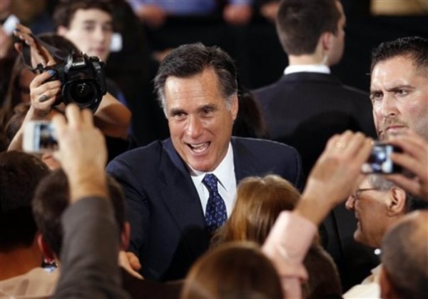 Republican presidential candidate, former Massachusetts Gov. Mitt Romney, greets supporters at his election watch party after winning the Michigan primary in Novi, Mich., Tuesday, Feb. 28. Republican presidential candidate, former Massachusetts Gov. Mitt Romney, greets supporters at his election watch party after winning the Michigan primary in Novi, Mich., Tuesday, Feb. 28.