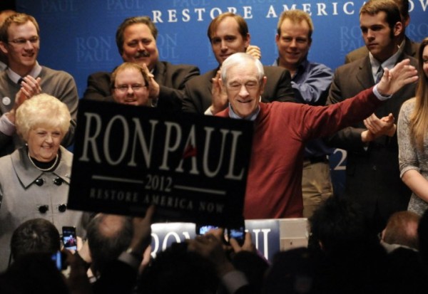 Republican presidential candidate Rep. Ron Paul, R-Texas, waves to supporters as he arrives to address them during his caucus night party Tuesday, Feb. 7, in Golden Valley, Minn. At left is Paul's wife Carol. Republican presidential candidate Rep. Ron Paul, R-Texas, waves to supporters as he arrives to address them during his caucus night party Tuesday, Feb. 7, in Golden Valley, Minn. At left is Paul's wife Carol.