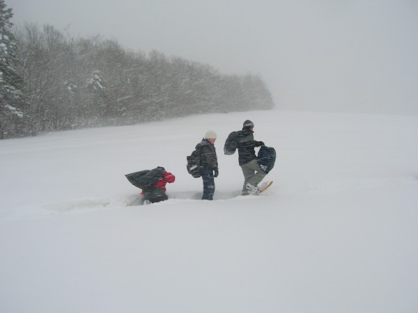 Nicholas Albert, Evan Albert and Noah Wickenheiser snowshoe across a field in Saturday's snowstorm after a campout in the nearby woods in Madawaska. At least 12 inches of snow had fallen Saturday morning since the previous night. Feb. 25, 2012. Nicholas Albert, Evan Albert and Noah Wickenheiser snowshoe across a field in Saturday's snowstorm after a campout in the nearby woods in Madawaska. At least 12 inches of snow had fallen Saturday morning since the previous night. Feb. 25, 2012.