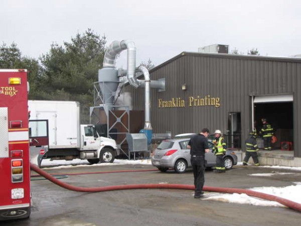Firefighters find smoke pouring from the top of a trash compactor on the west side of Franklin Printng when they were called to the Wilton Road printing firm about noon on Sunday, March 4, 2012 in Farmington. Firefighters find smoke pouring from the top of a trash compactor on the west side of Franklin Printng when they were called to the Wilton Road printing firm about noon on Sunday, March 4, 2012 in Farmington.