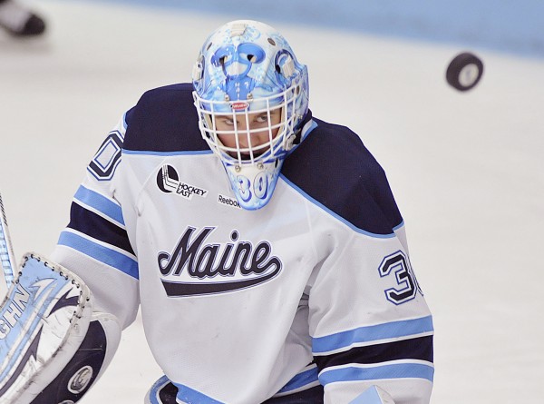 Maine goalie Dan Sullivan watches the puck after a stick save in the third period of their NCAA college hockey game against Boston College in January 2012 in Orono. Maine goalie Dan Sullivan watches the puck after a stick save in the third period of their NCAA college hockey game against Boston College in January 2012 in Orono.