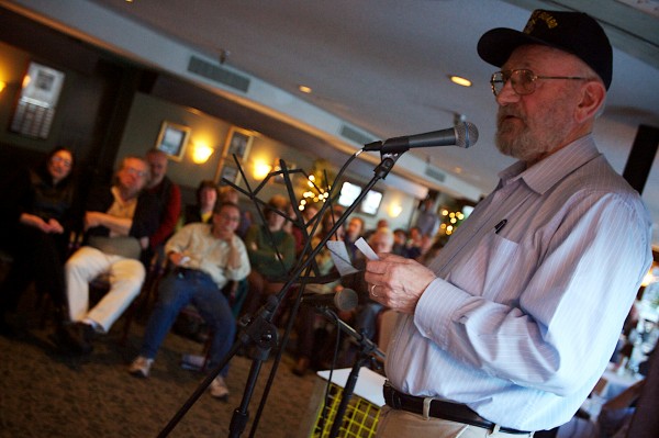 Storyteller, poet and former Coast Guardsman Kendall Morse recites a funny poem he wrote about thick fog on Penobscot Bay at DiMillo's restaurant in Portland as part of the Maine Maritime Museum's "Voices of the Sea: The Poetry and Song of Maines Fishermen and Those Who Work on the Water" event on Thursday. Storyteller, poet and former Coast Guardsman Kendall Morse recites a funny poem he wrote about thick fog on Penobscot Bay at DiMillo's restaurant in Portland as part of the Maine Maritime Museum's "Voices of the Sea: The Poetry and Song of Maines Fishermen and Those Who Work on the Water" event on Thursday.