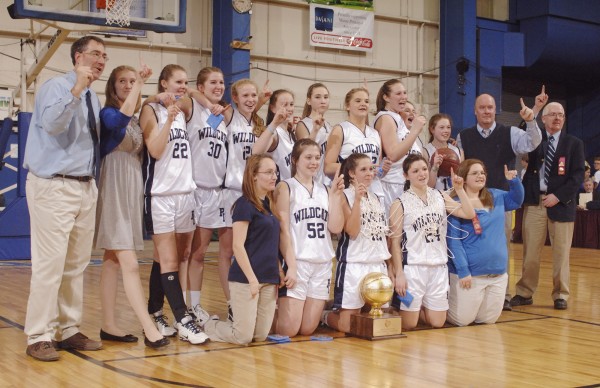 The Presque Isle girls basketball team poses for a photo as the state Class B basketball champions at the Bangor Auditorium Friday, March 2, 2012. The Presque Isle girls basketball team poses for a photo as the state Class B basketball champions at the Bangor Auditorium Friday, March 2, 2012.
