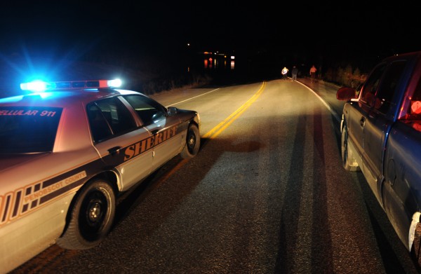A police cruiser blocks Route 15 in Orrington as water flows over the road on Friday, March 23, 2012. A dam on Swetts Pond broke, sending flood waters rushing down Swetts Pond Road and flowing over Route 15. A police cruiser blocks Route 15 in Orrington as water flows over the road on Friday, March 23, 2012. A dam on Swetts Pond broke, sending flood waters rushing down Swetts Pond Road and flowing over Route 15.
