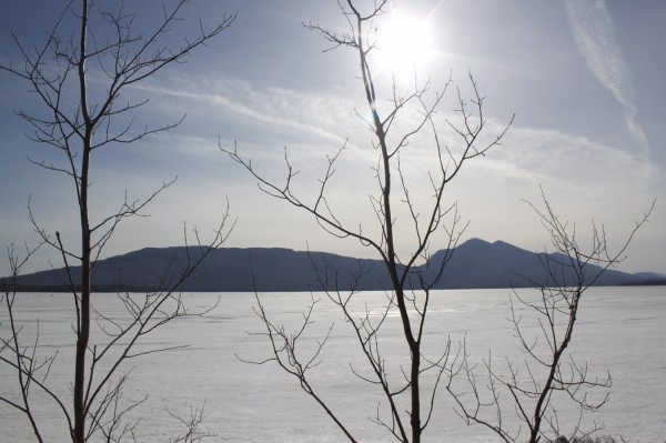 The Bigelow Mountain Range can be seen past Flagstaff Lake from the Maine Huts & Trails snowshoe trail, Shore Trail, on March 12, 2012. The Bigelow Mountain Range can be seen past Flagstaff Lake from the Maine Huts & Trails snowshoe trail, Shore Trail, on March 12, 2012.