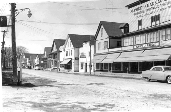 A view of Fort Kent's West Main Street in the 1950s shows the buildings of Alphee Nadeau (right) and two others destroyed in last weekend's fire. A view of Fort Kent's West Main Street in the 1950s shows the buildings of Alphee Nadeau (right) and two others destroyed in last weekend's fire.