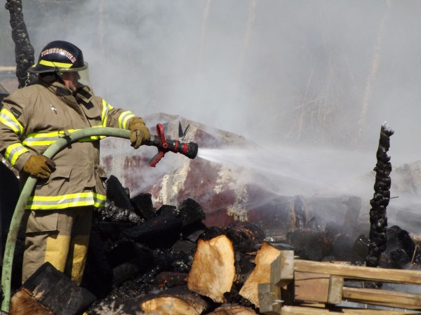 A firefighter with the Newport Fire Department attempts to put out some remaining flames at a fire that consumed three storage trailers on Rutland Road in Newport on Thursday, March 22, 2012. No one was hurt. A firefighter with the Newport Fire Department attempts to put out some remaining flames at a fire that consumed three storage trailers on Rutland Road in Newport on Thursday, March 22, 2012. No one was hurt.