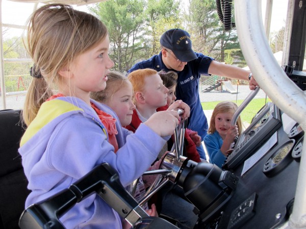 Jewett Elementary School kindergartners (from left) Elizabeth Rainey, Maureen Tyne, Tristan Davis and Guinevere Berry get to sit behind the controls of a 26-foot U.S. Coast Guard boat on Wednesday, April 25, 2012, as part of a boating safety demonstration at the school. Jewett Elementary School kindergartners (from left) Elizabeth Rainey, Maureen Tyne, Tristan Davis and Guinevere Berry get to sit behind the controls of a 26-foot U.S. Coast Guard boat on Wednesday, April 25, 2012, as part of a boating safety demonstration at the school.