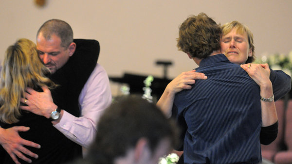 Clark Noonan's parents Christine (right) and Edward Noonan received the condolences of hundreds of people who attended the service at the Bangor Baptist Church on Tuesday, April 17, 2012. Noonan, a former Bangor High star athlete and later a member of the Saint Joseph's College basketball team, died at the age of 20 in a car accident Saturday morning. Clark Noonan's parents Christine (right) and Edward Noonan received the condolences of hundreds of people who attended the service at the Bangor Baptist Church on Tuesday, April 17, 2012. Noonan, a former Bangor High star athlete and later a member of the Saint Joseph's College basketball team, died at the age of 20 in a car accident Saturday morning.
