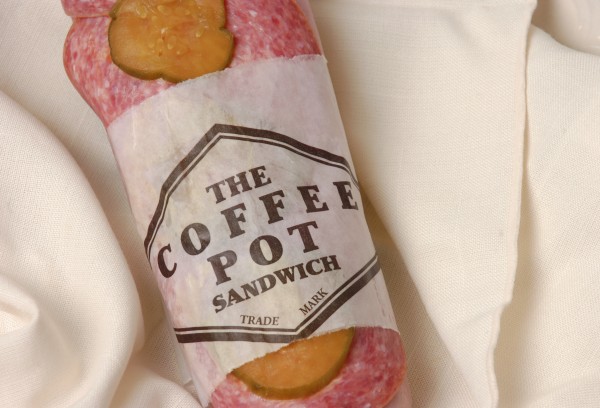 The distinctive original Coffee Pot sandwich was an Italian made with ham or salami, onions, cheese and vegetables. The distinctive original Coffee Pot sandwich was an Italian made with ham or salami, onions, cheese and vegetables.