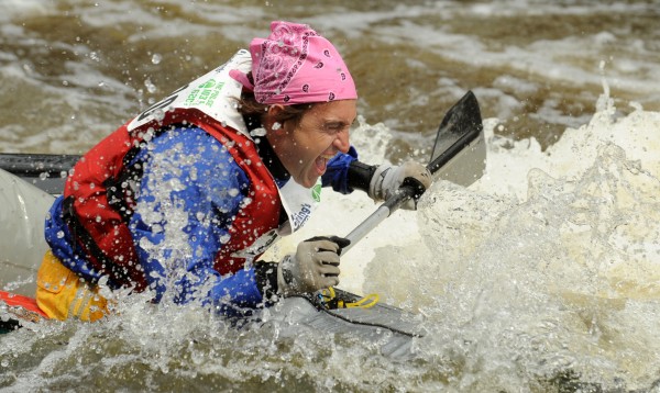 A competitor reacts as his canoe gets swamped with cold water at the "Shopping Cart" during the 45th annual Kenduskeag Stream Race in April 2011. A competitor reacts as his canoe gets swamped with cold water at the "Shopping Cart" during the 45th annual Kenduskeag Stream Race in April 2011.