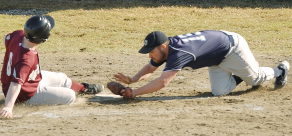 Calais pitcher Adam Geel (19) covers homeplate after throwing a wild pitch in the first inning, that allowed Washington Academy's Fred MacLean (6) to score during the game Friday, April 13, 2012. Calais pitcher Adam Geel (19) covers homeplate after throwing a wild pitch in the first inning, that allowed Washington Academy's Fred MacLean (6) to score during the game Friday, April 13, 2012.
