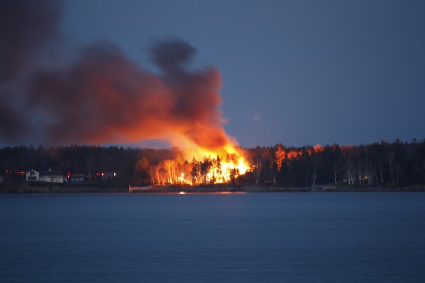 A fire on Mere Point in Brunswick as seen across Maquoit Bay from Freeport. A fire on Mere Point in Brunswick as seen across Maquoit Bay from Freeport.
