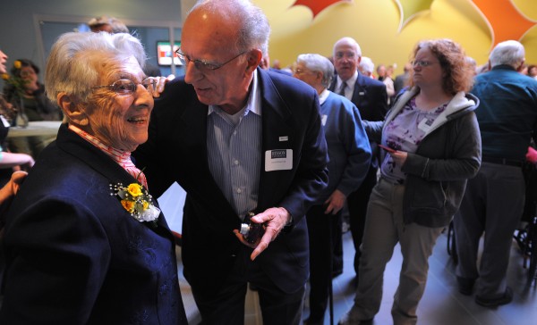 Clara Swan, a 1933 Husson graduate, talks to Larry Richard from the Class of 1956 during a party celebrating Swan's 100th birthday at Husson University in Bangor. Swan reminded people that the Titanic sank and the Boston Red Sox was founded the same year she was born. Clara Swan, a 1933 Husson graduate, talks to Larry Richard from the Class of 1956 during a party celebrating Swan's 100th birthday at Husson University in Bangor. Swan reminded people that the Titanic sank and the Boston Red Sox was founded the same year she was born.