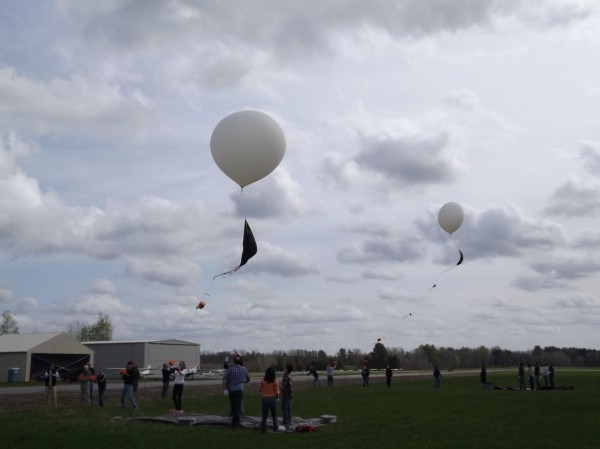 University of Maine High-Altitude Ballooning project students along with several Bangor High School students help launch two balloons at Pittsfield Municipal Airport on Wednesday, April 25, 2012. University of Maine High-Altitude Ballooning project students along with several Bangor High School students help launch two balloons at Pittsfield Municipal Airport on Wednesday, April 25, 2012.