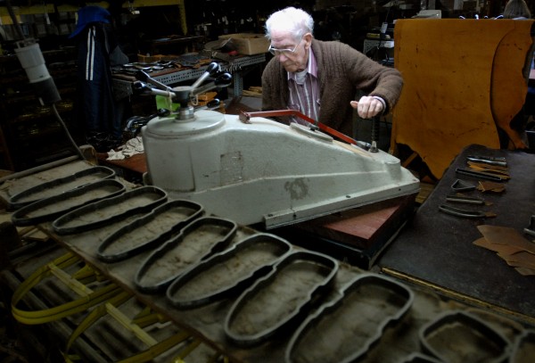 Chester Terrill, who will turn 86 on April 30, uses cutting dies to cut leather at Highland Shoe in Brewer on Thursday. Terrill, who has worked in the shoemaking industry since 1948, has been employed at Highland for about 8 years. Chester Terrill, who will turn 86 on April 30, uses cutting dies to cut leather at Highland Shoe in Brewer on Thursday. Terrill, who has worked in the shoemaking industry since 1948, has been employed at Highland for about 8 years.