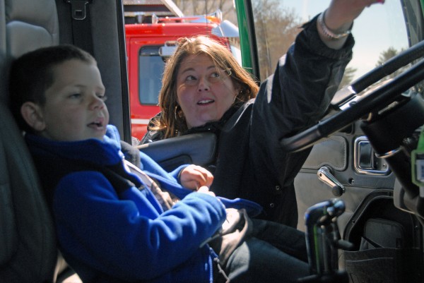 Kelly Hoxie of Lincoln points to the air horn in one of a dozen trucks on display at the 2012 Lincoln Lakes Region Chamber of Commerces Business Expo at Mattanawcook Academy of Lincoln on Saturday, April 28, 2012. Kelly Hoxie of Lincoln points to the air horn in one of a dozen trucks on display at the 2012 Lincoln Lakes Region Chamber of Commerces Business Expo at Mattanawcook Academy of Lincoln on Saturday, April 28, 2012.