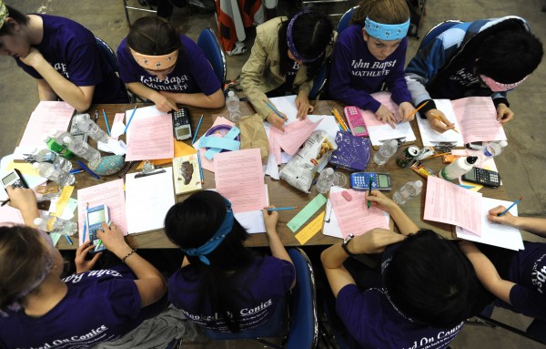Members of the John Bapst math team work on math problems during the team round of the 36th annual Maine Math Meet at the Bangor Auditorium on Tuesday, April 10, 2012. Members of the John Bapst math team work on math problems during the team round of the 36th annual Maine Math Meet at the Bangor Auditorium on Tuesday, April 10, 2012.
