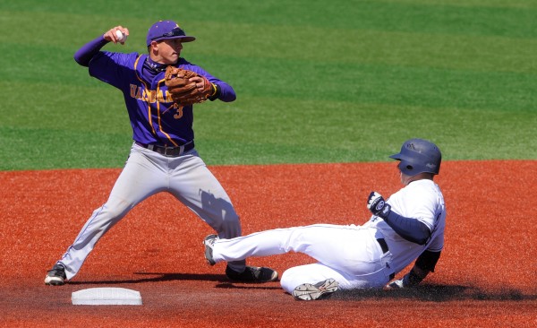 Albany's Gordon Madej prepares to throw the ball as the University of Maine's Tyler Patzalek slides to second base during the second inning of the game in Orono on Saturday, April 28, 2012. Patzalek was out on the play. Albany's Gordon Madej prepares to throw the ball as the University of Maine's Tyler Patzalek slides to second base during the second inning of the game in Orono on Saturday, April 28, 2012. Patzalek was out on the play.