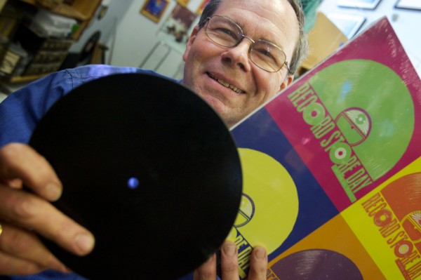 Dave Hunt of Vinylhaven Records on Maine Street in Brunswick holds one record from 1889 (left) and one from 2009. "The record's demise has been greatly exaggerated," he said. He'll be celebrating Record Store Day on Saturday with raffles, doughnuts and live music. Dave Hunt of Vinylhaven Records on Maine Street in Brunswick holds one record from 1889 (left) and one from 2009. "The record's demise has been greatly exaggerated," he said. He'll be celebrating Record Store Day on Saturday with raffles, doughnuts and live music.