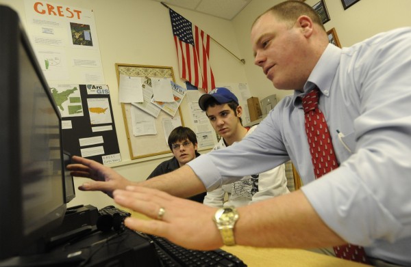 Deer Isle-Stonington High School Principal Todd West visits a technology class in 2010. West is credited with leading the implementation of changes that have significantly improved the small school's graduation rate and reduced the number of dropouts. Deer Isle-Stonington High School Principal Todd West visits a technology class in 2010. West is credited with leading the implementation of changes that have significantly improved the small school's graduation rate and reduced the number of dropouts.
