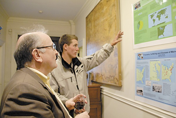 Local historian Richard R. Shaw listens as Bangor High School student Jon Stanhope discusses a map that he and fellow student Robin Murphy researched and developed for a world geography class. The map’s title is “Pirates, Sailors, & Shipwrecks! Oh, My!” Local historian Richard R. Shaw listens as Bangor High School student Jon Stanhope discusses a map that he and fellow student Robin Murphy researched and developed for a world geography class. The map’s title is “Pirates, Sailors, & Shipwrecks! Oh, My!”