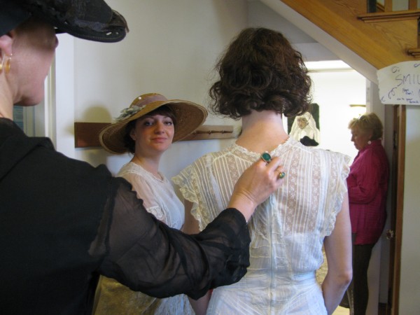 Local women modeling vintage fashions Saturday, May 19, 2012 at St. Margaret's Episcopal Church parish hall in Belfast get ready for their turn on the runway. Caseylin Darcy (center) and others are garbed in the clothing of the late 1800s. Local women modeling vintage fashions Saturday, May 19, 2012 at St. Margaret's Episcopal Church parish hall in Belfast get ready for their turn on the runway. Caseylin Darcy (center) and others are garbed in the clothing of the late 1800s.