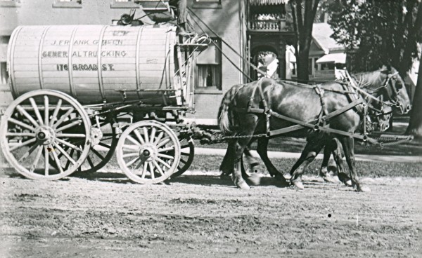 Wagons carrying tanks of water sprinkled the streets of Bangor to keep down the dust. Wagons carrying tanks of water sprinkled the streets of Bangor to keep down the dust.