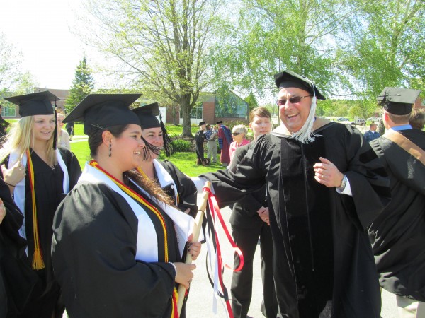 Gov. Paul LePage congratulates Thomas College graduates on Saturday, May 12, 2012 in Waterville. LePage was the ceremony's commencement speaker and recipient of an honorary doctorate in science and business administration. Gov. Paul LePage congratulates Thomas College graduates on Saturday, May 12, 2012 in Waterville. LePage was the ceremony's commencement speaker and recipient of an honorary doctorate in science and business administration.