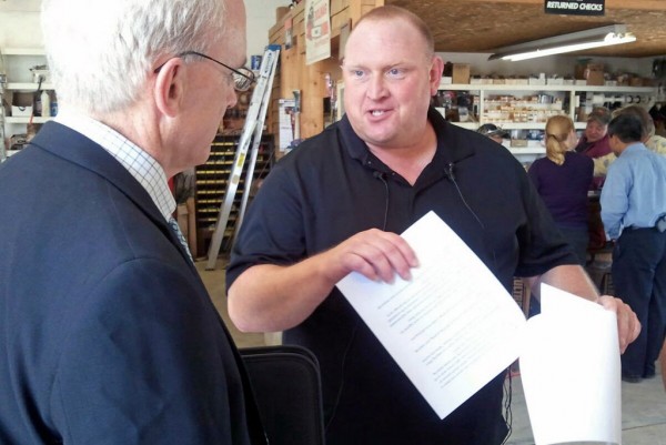 Brownville Town Manager Matthew Pineo talks to Brian Doyle of the Maine Department of Economic and Community Development during a press conference about flood damage in Brownville on Thursday, June 28, 2012. Brownville Town Manager Matthew Pineo talks to Brian Doyle of the Maine Department of Economic and Community Development during a press conference about flood damage in Brownville on Thursday, June 28, 2012.