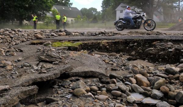 A parking lot along Route 11 was completely washed away in the flood following heavy rain Saturday evening in Brownville. A parking lot along Route 11 was completely washed away in the flood following heavy rain Saturday evening in Brownville.