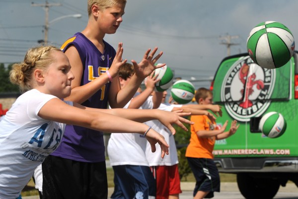 Elizabeth White, 11, of Veazie (left) and 14-year-old Sam Brown of Lee hone their passing skills in August 2010 during a Maine Red Claws basketball clinic in Brewer. They were among 25 youngsters who participated in the clinic conducted by Red Claws coach Austin Alinge. Elizabeth White, 11, of Veazie (left) and 14-year-old Sam Brown of Lee hone their passing skills in August 2010 during a Maine Red Claws basketball clinic in Brewer. They were among 25 youngsters who participated in the clinic conducted by Red Claws coach Austin Alinge.