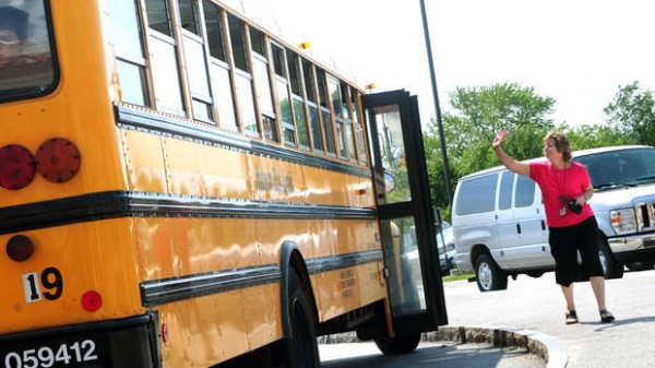Education technician Pat Cloutier waves goodbye to students as they leave Geiger Elementary School in Lewiston on June 11, 2012 for the summer. Lewiston Superintendent Bill Webster wants more summer programs for students because he says students are losing too much of what they've learned from being out of school for 10 to 11 weeks. A new six-week program will be piloted at Longley Elementary this summer. Education technician Pat Cloutier waves goodbye to students as they leave Geiger Elementary School in Lewiston on June 11, 2012 for the summer. Lewiston Superintendent Bill Webster wants more summer programs for students because he says students are losing too much of what they've learned from being out of school for 10 to 11 weeks. A new six-week program will be piloted at Longley Elementary this summer.
