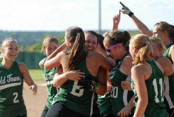 The Old Town Coyotes celebrate their 4-1 victory over Fryeburg Academy in the Class B State Championship game Saturday afternoon, June 16, 2012 at Coffin Field in Brewer. The Old Town Coyotes celebrate their 4-1 victory over Fryeburg Academy in the Class B State Championship game Saturday afternoon, June 16, 2012 at Coffin Field in Brewer.
