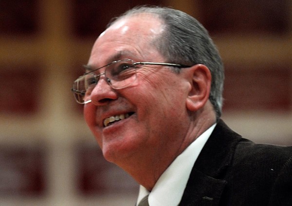 Bangor High School boys basketball coach Roger Reed smiles as his team defeats Skowhegan 63-39 for Reed's 500th career victory on Feb. 2, 2008. Bangor High School boys basketball coach Roger Reed smiles as his team defeats Skowhegan 63-39 for Reed's 500th career victory on Feb. 2, 2008.