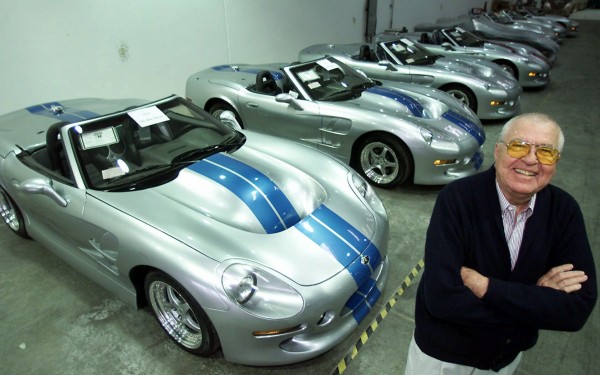 In this Friday, Oct. 27, 2000 file photo, automotive legend Carroll Shelby poses in front of his Shelby Series 1 sports cars at his plant in Las Vegas, Nev. In this Friday, Oct. 27, 2000 file photo, automotive legend Carroll Shelby poses in front of his Shelby Series 1 sports cars at his plant in Las Vegas, Nev.