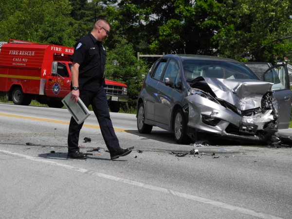 A Hancock County Sheriff's Office accident investigator surveys the scene of a fatal crash on Route 1, near the intersection with Route 175 on June 9, 2012. One person died in the two-car collision that was reported at 12:50 p.m. A Hancock County Sheriff's Office accident investigator surveys the scene of a fatal crash on Route 1, near the intersection with Route 175 on June 9, 2012. One person died in the two-car collision that was reported at 12:50 p.m.
