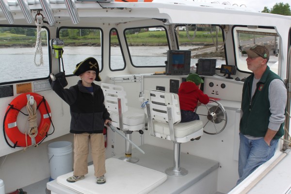 Capt. James Robertson of Harrington sits aboard “Kandi Leigh” with his son McKade, 4, (left) and Brody, 2, on June 6, 2012, before embarking on a seabird cruise. Capt. James Robertson of Harrington sits aboard “Kandi Leigh” with his son McKade, 4, (left) and Brody, 2, on June 6, 2012, before embarking on a seabird cruise.