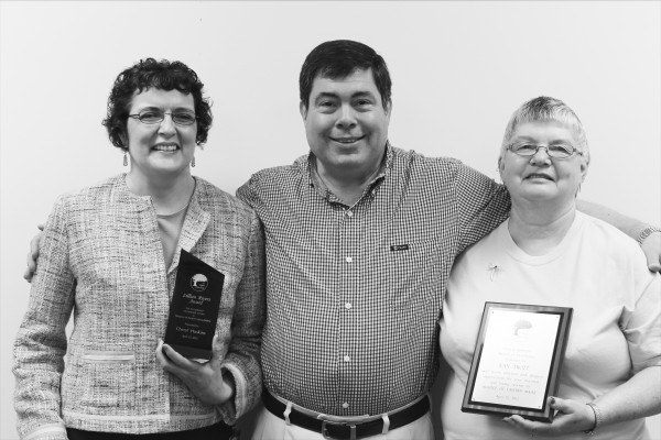Wayne Melanson, volunteer manager of Hospice of Eastern Maine (center), congratulates Cheryl Huskins (left), recipient of the Lillian Rivers Award and Jean Trott , recipient of the Patricia James Award for exceptional volunteer service. Wayne Melanson, volunteer manager of Hospice of Eastern Maine (center), congratulates Cheryl Huskins (left), recipient of the Lillian Rivers Award and Jean Trott , recipient of the Patricia James Award for exceptional volunteer service.