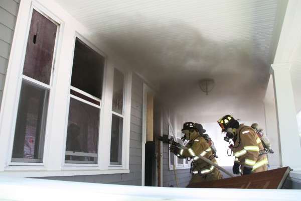 Rockland firefighters battle a fire at a home on Broadway on Thursday, June 14, 2012. Rockland firefighters battle a fire at a home on Broadway on Thursday, June 14, 2012.