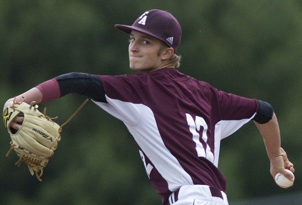 Foxcroft Academy High School baseball pitcher Kaleb Smith (12) delivers a pitch in the second inning of their State Class B Championship game against Falmouth High School in Bangor on Saturday, June 16, 2012. Foxcroft Academy High School baseball pitcher Kaleb Smith (12) delivers a pitch in the second inning of their State Class B Championship game against Falmouth High School in Bangor on Saturday, June 16, 2012.