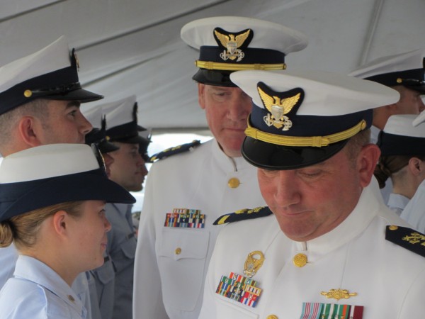 Paul Dupuis, commander of the Coast Guard buoy tender Abbie Burgess (foreground), inspects the crew of the Coast Guard cutter along with incoming Commanding Officer John Huard during a change of command ceremony Friday morning at the Rockland Coast Guard station. Paul Dupuis, commander of the Coast Guard buoy tender Abbie Burgess (foreground), inspects the crew of the Coast Guard cutter along with incoming Commanding Officer John Huard during a change of command ceremony Friday morning at the Rockland Coast Guard station.