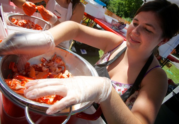 Lexi Rich picks lobster meat at the 47th annual Yarmouth Clam Festival on Friday, July 20, 2012. Lexi Rich picks lobster meat at the 47th annual Yarmouth Clam Festival on Friday, July 20, 2012.