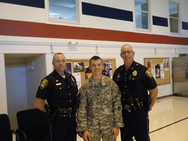 Augusta police officer Eric Dos Santos (center) poses with Lt. Kevin Lully and Chief Robert Gregoire after he was given command of the 488th Military Police Company, which is heading to Afghanistan for a year. Dos Santos is an Army Captain. The unit's sendoff ceremony is 10 a.m. Saturday, July 21, 2012 at the Augusta Civic Center. Augusta police officer Eric Dos Santos (center) poses with Lt. Kevin Lully and Chief Robert Gregoire after he was given command of the 488th Military Police Company, which is heading to Afghanistan for a year. Dos Santos is an Army Captain. The unit's sendoff ceremony is 10 a.m. Saturday, July 21, 2012 at the Augusta Civic Center.