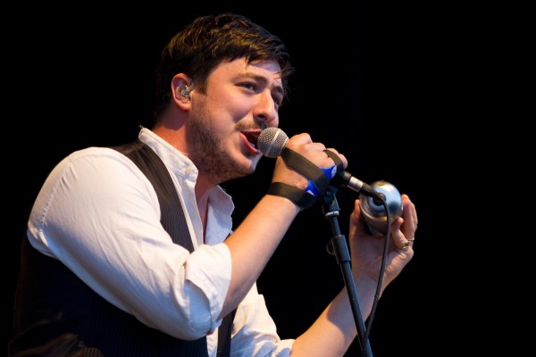 Marcus Mumford, lead singer of British folk rock band Mumford & Sons, performs during their concert at the Optimus Alive music festival in Lisbon on Saturday, July 14, 2012. Marcus Mumford, lead singer of British folk rock band Mumford & Sons, performs during their concert at the Optimus Alive music festival in Lisbon on Saturday, July 14, 2012.