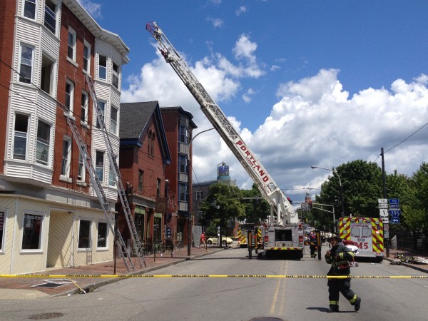 Congress Street in Portland was blocked off after fire a fire started at an apartment house on Monday, July 2, 2012. Congress Street in Portland was blocked off after fire a fire started at an apartment house on Monday, July 2, 2012.