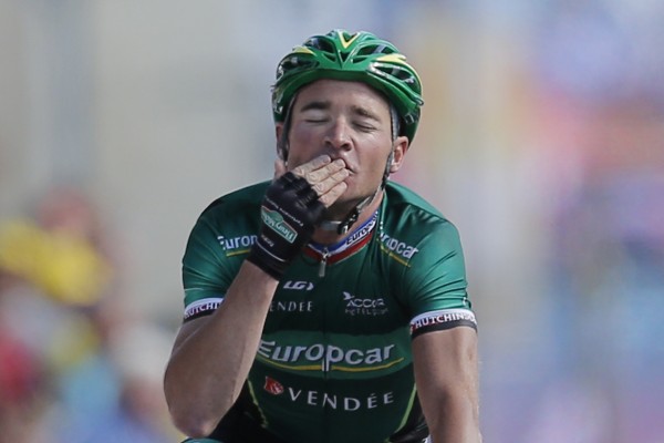 Thomas Voeckler of France crosses the finish line to win the 10th stage of the Tour de France cycling race over 194.5 kilometers (120.9 miles) with start in Macon and finish in Bellegarde-sur-Valserine, France, Wednesday, July 11, 2012. Thomas Voeckler of France crosses the finish line to win the 10th stage of the Tour de France cycling race over 194.5 kilometers (120.9 miles) with start in Macon and finish in Bellegarde-sur-Valserine, France, Wednesday, July 11, 2012.